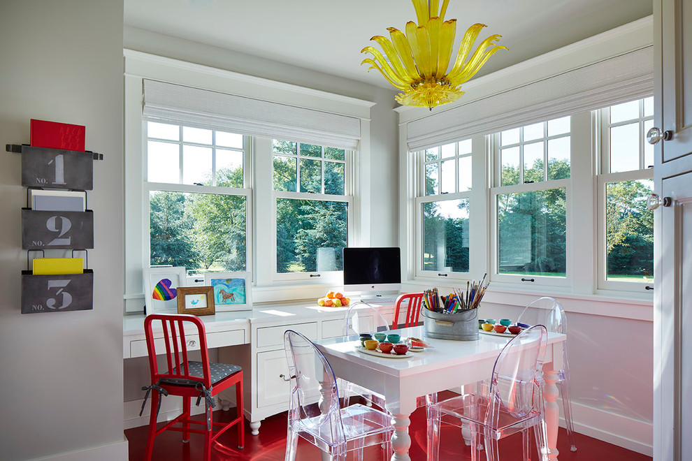 Transitional craft room in Minneapolis with grey walls, a built-in desk, red floor and painted wood floors.