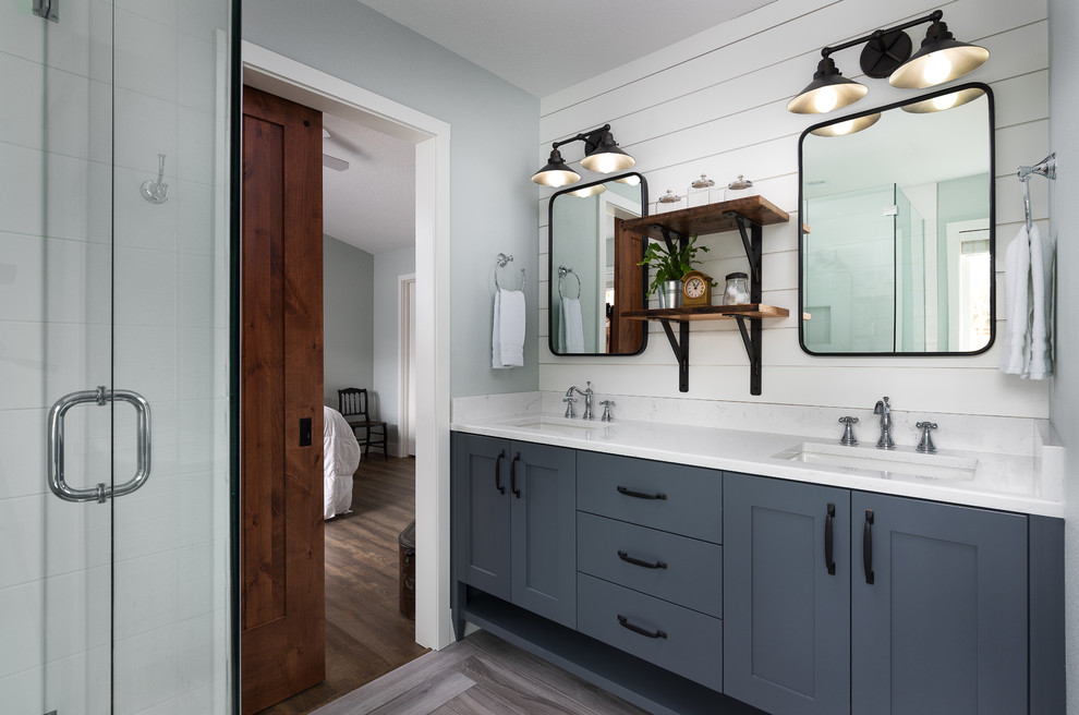 Photo of a mid-sized country master bathroom in Portland with shaker cabinets, grey cabinets, an undermount sink, engineered quartz benchtops, grey floor and white walls.