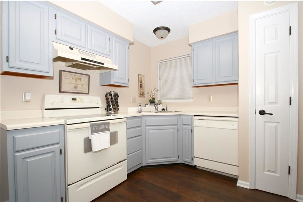 Design ideas for a traditional kitchen in Indianapolis with grey cabinets.