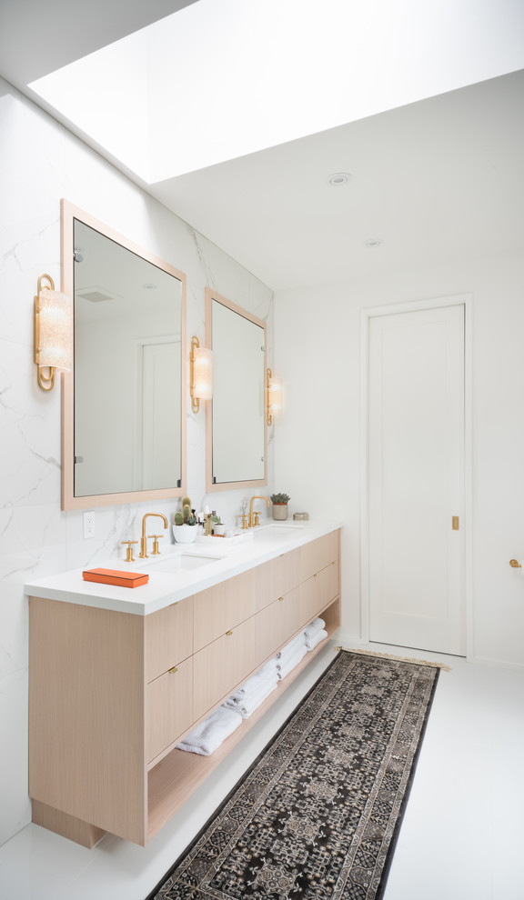 Design ideas for a large scandinavian master bathroom in Toronto with flat-panel cabinets, light wood cabinets, a double shower, white tile, porcelain tile, yellow walls, porcelain floors, an undermount sink, engineered quartz benchtops, white floor, a hinged shower door and white benchtops.