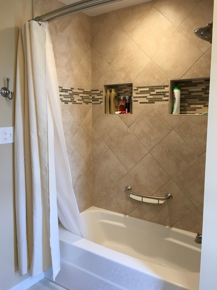 Design ideas for a mid-sized traditional master bathroom in Philadelphia with recessed-panel cabinets, white cabinets, an alcove tub, a shower/bathtub combo, a two-piece toilet, beige tile, ceramic tile, yellow walls, vinyl floors, an undermount sink and quartzite benchtops.