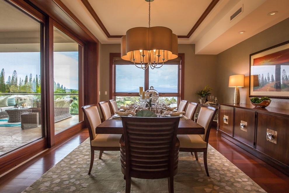 Mid-sized beach style dining room in Hawaii with medium hardwood floors and no fireplace.