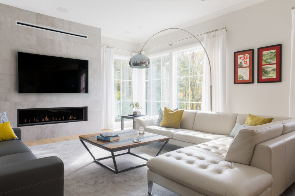 Photo of a contemporary family room in Boston.