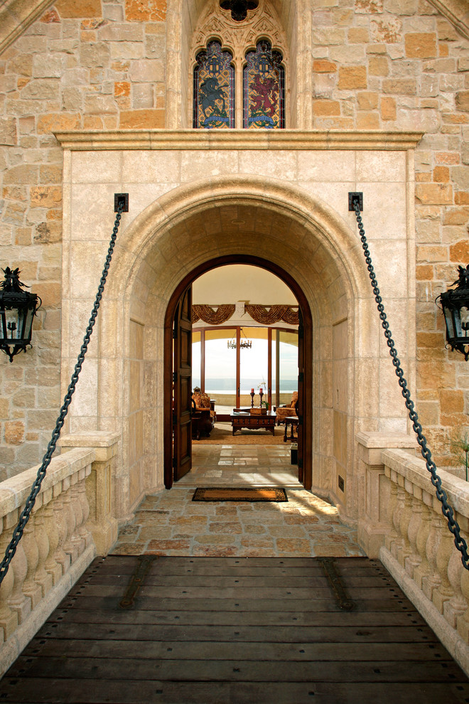 Design ideas for an expansive mediterranean front door in San Diego with a double front door.