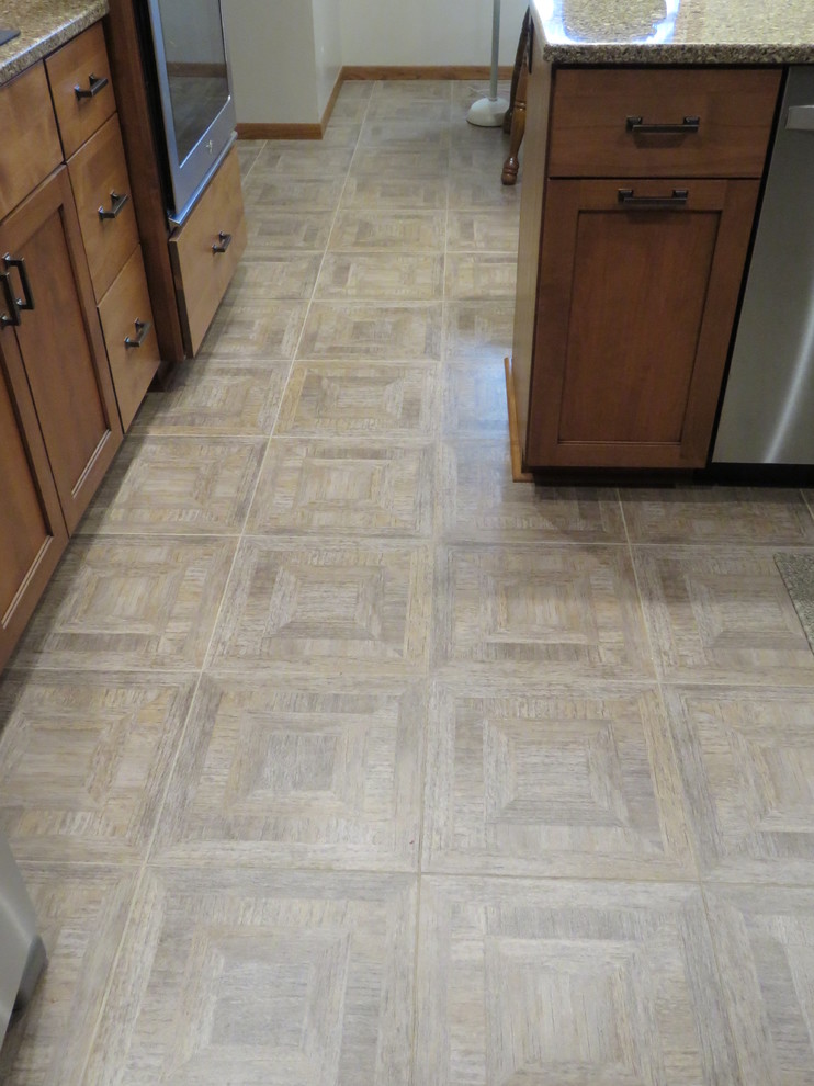 Inspiration for a mid-sized transitional u-shaped vinyl floor open concept kitchen remodel with a double-bowl sink, shaker cabinets, dark wood cabinets, quartz countertops, beige backsplash, cement tile backsplash, stainless steel appliances and a peninsula