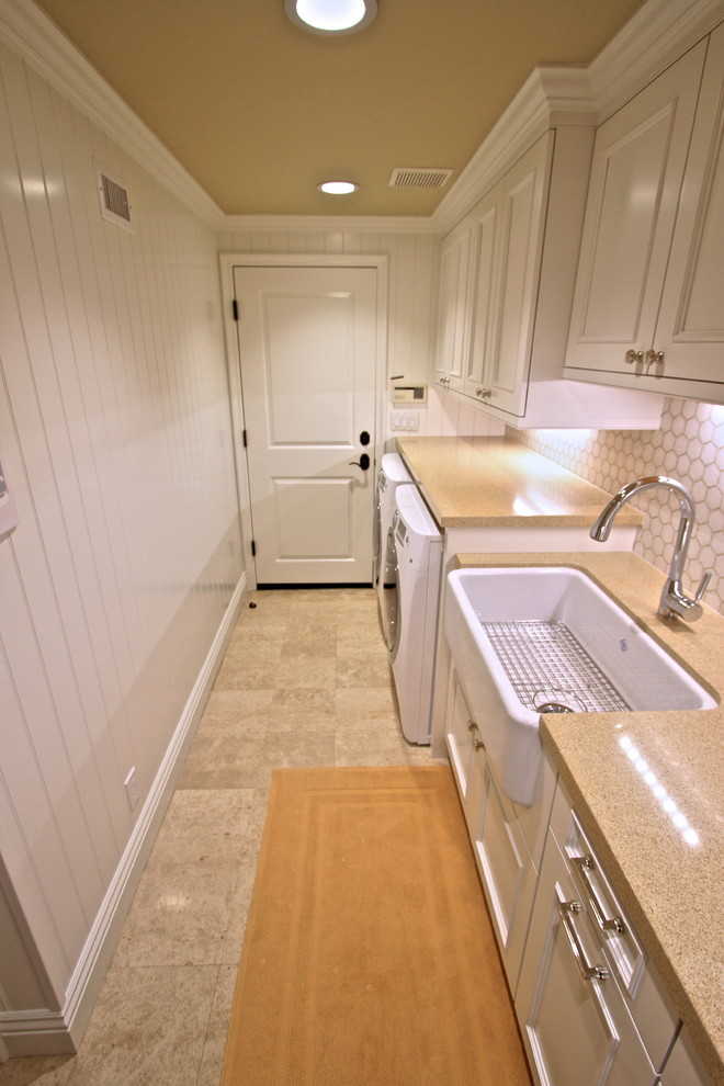 Photo of a traditional laundry room in Orange County.