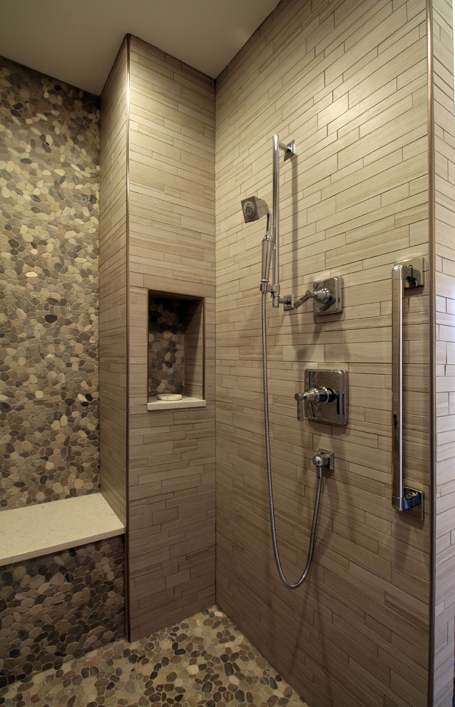 Inspiration for a rustic gray tile and porcelain tile pebble tile floor doorless shower remodel in Chicago with furniture-like cabinets, distressed cabinets, a one-piece toilet, beige walls, an undermount sink and quartz countertops