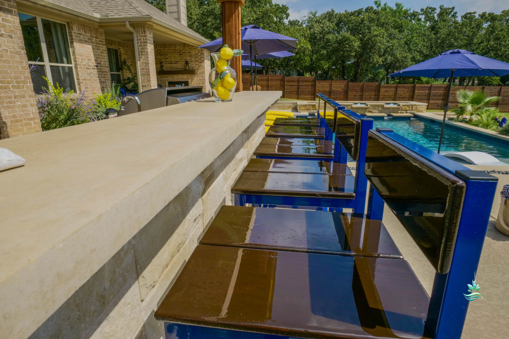 Huge tuscan backyard custom-shaped infinity pool landscaping photo in Dallas with decking