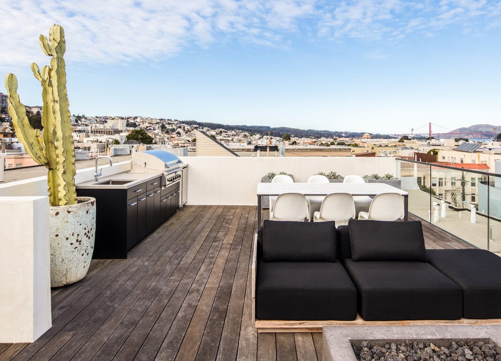 Photo of a contemporary rooftop and rooftop deck in San Francisco with an outdoor kitchen and no cover.