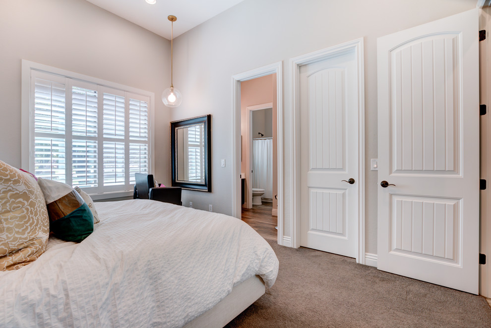 Photo of a mid-sized transitional kids' room for girls in Phoenix with grey walls, carpet and grey floor.