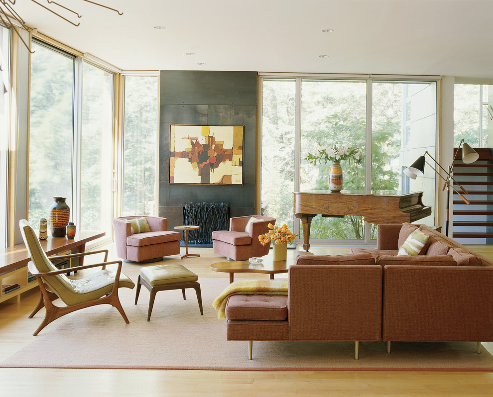 Inspiration for a country living room in New York with a music area and light hardwood floors.
