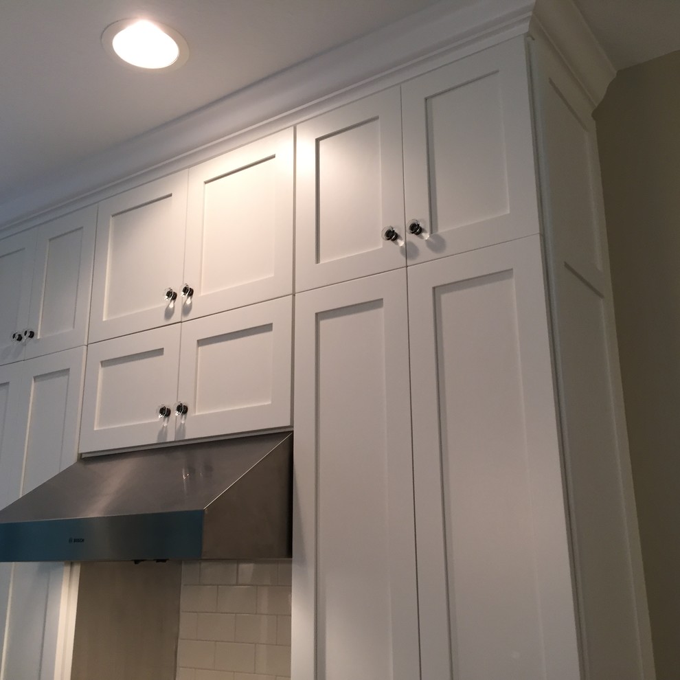 Mid-sized transitional home design photo in Miami