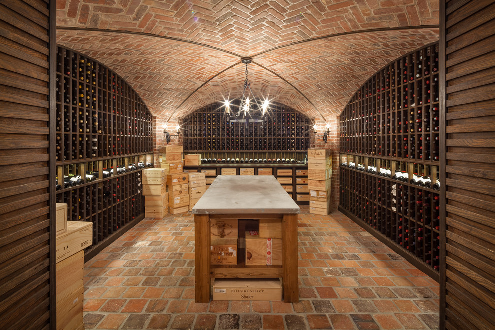 Design ideas for a traditional wine cellar in New York with brick floors and storage racks.