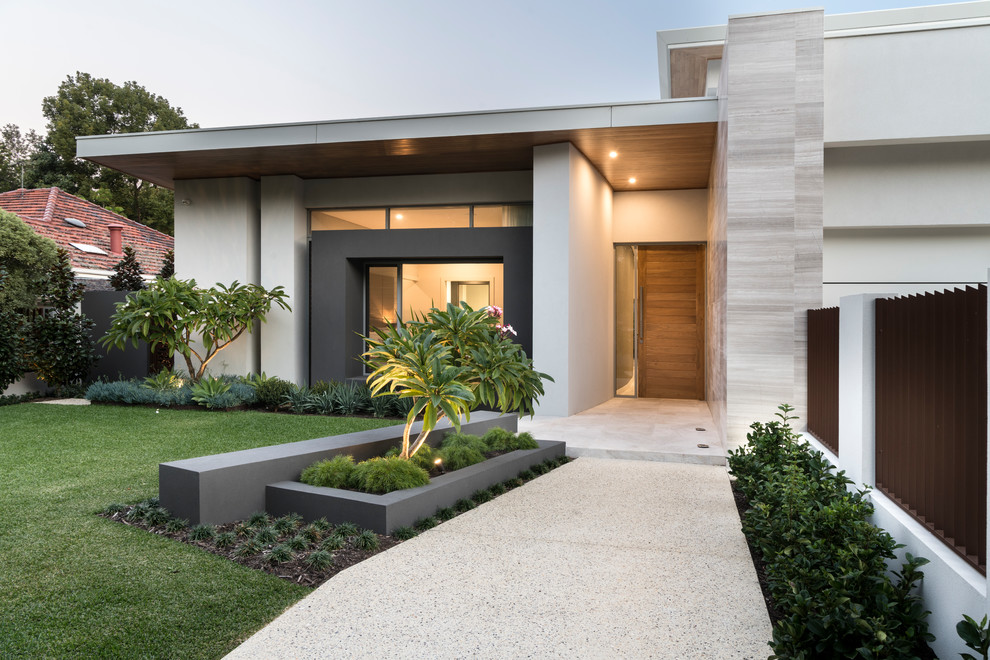 Photo of an expansive contemporary two-storey grey house exterior in Perth with mixed siding and a flat roof.