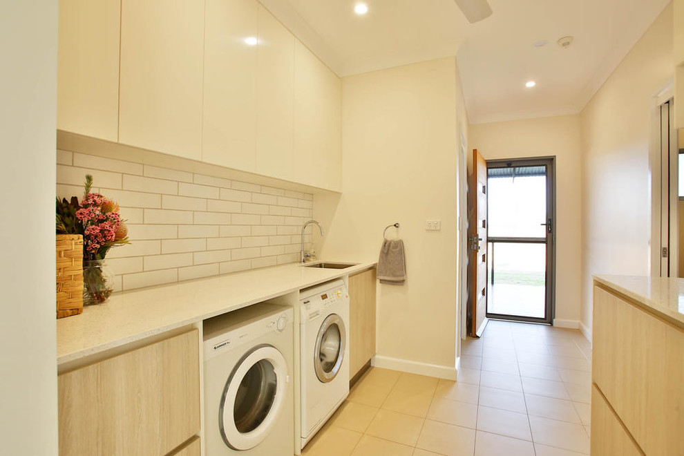 Contemporary laundry room in Darwin.