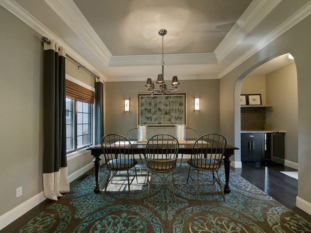 Design ideas for a traditional separate dining room in Denver with grey walls and dark hardwood floors.