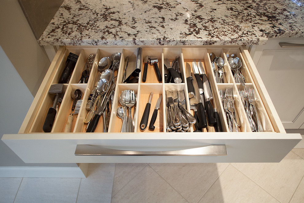 Example of a transitional home design design in Vancouver