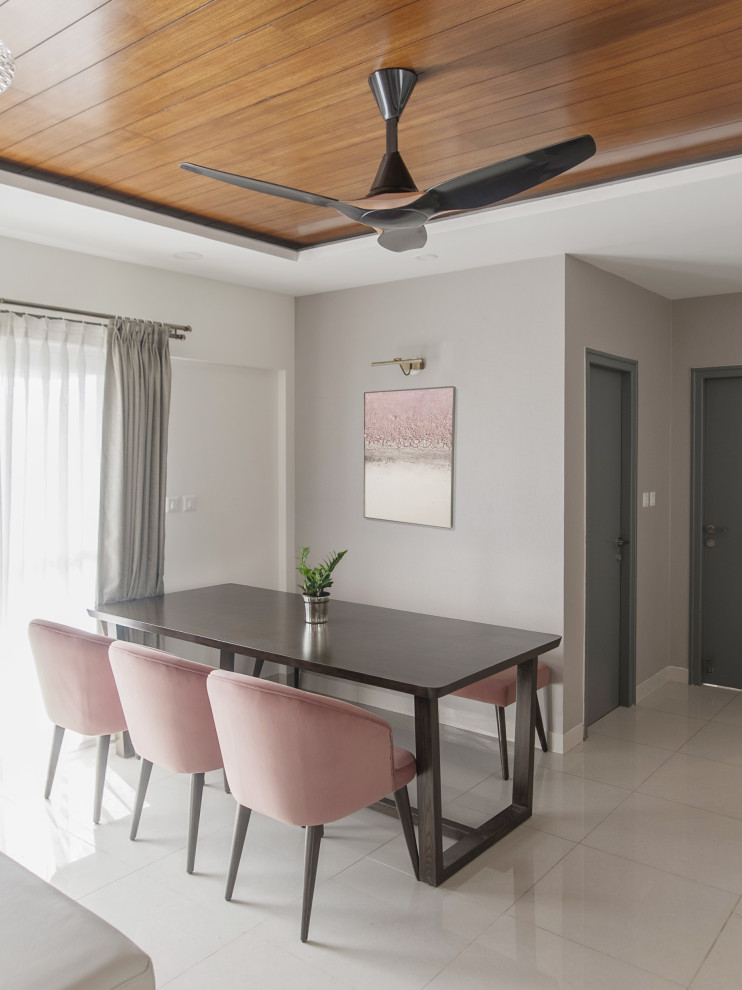 Inspiration for a contemporary dining room in Bengaluru.