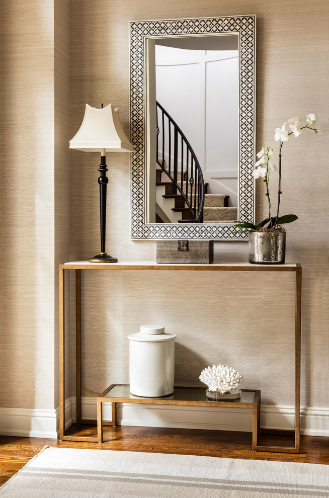 Foyer - large transitional dark wood floor foyer idea in Miami with beige walls and a dark wood front door