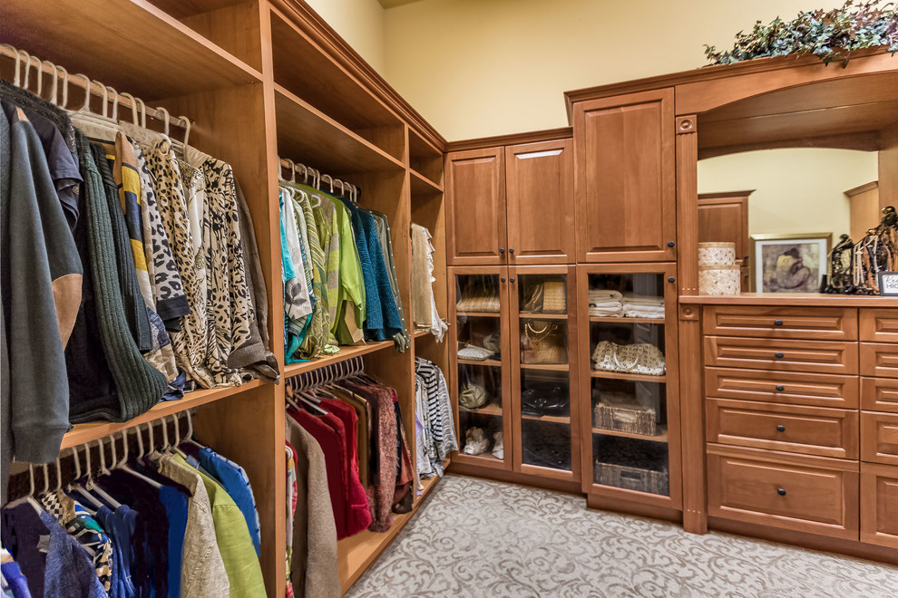 This is an example of a traditional storage and wardrobe in Tampa.