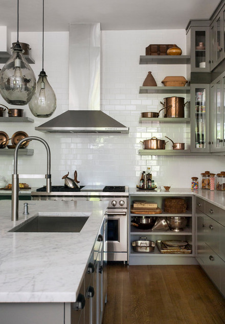 Eat-in kitchen - mid-sized rustic single-wall porcelain tile eat-in kitchen idea with a farmhouse sink, subway tile backsplash, stainless steel appliances and two islands