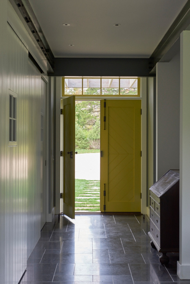 Mid-sized country front door in New York with white walls, limestone floors, a double front door and a green front door.