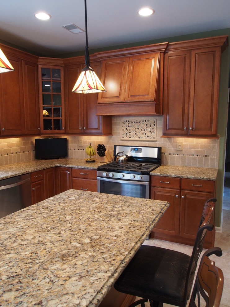 Example of a transitional kitchen design in New York