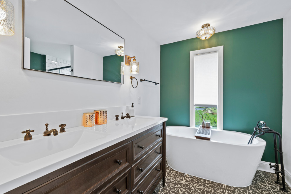 Inspiration for a contemporary master bathroom in Baltimore with brown cabinets, a freestanding tub, an alcove shower, quartzite benchtops, white benchtops, a double vanity and a freestanding vanity.
