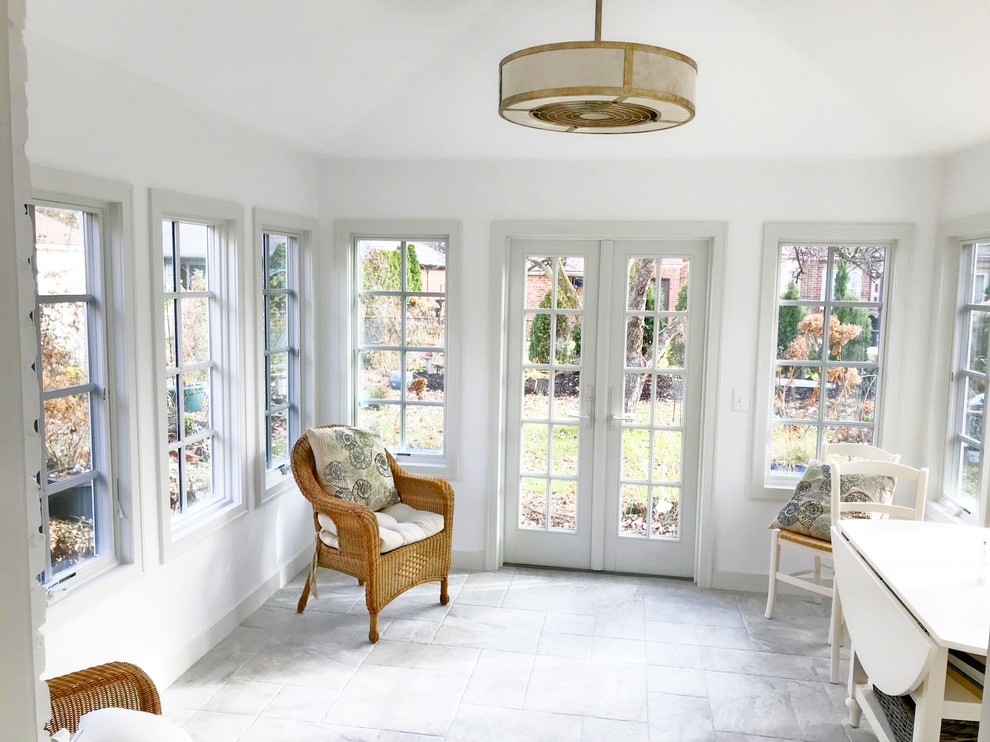 This is an example of a large traditional sunroom in Detroit with ceramic floors and grey floor.