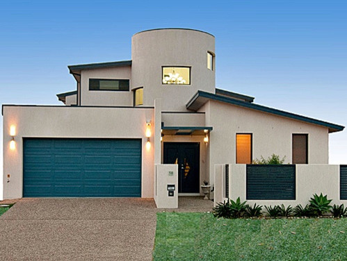 Photo of a large contemporary two-storey concrete beige exterior in Central Coast.