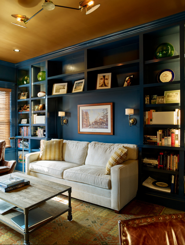 Beach style home office in Portland Maine with a library and blue walls.