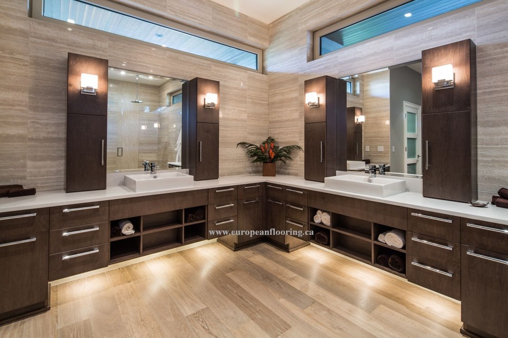 Example of a huge trendy master brown tile medium tone wood floor bathroom design in Toronto with a vessel sink, flat-panel cabinets, dark wood cabinets and brown walls