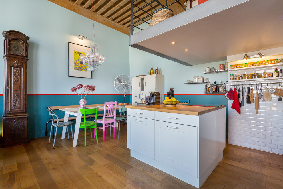 Photo of an eclectic open plan kitchen in Lyon.
