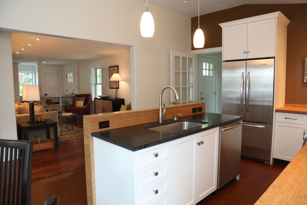 Inspiration for a small arts and crafts galley separate kitchen in Philadelphia with an undermount sink, recessed-panel cabinets, white cabinets, granite benchtops, stainless steel appliances and with island.