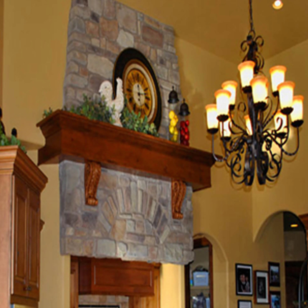 Example of a mountain style home design design in Denver