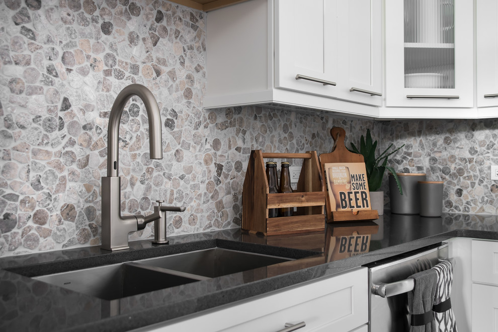 Large transitional l-shaped dark wood floor eat-in kitchen photo in Chicago with an undermount sink, shaker cabinets, white cabinets, marble countertops, multicolored backsplash, stone tile backsplash, stainless steel appliances and an island