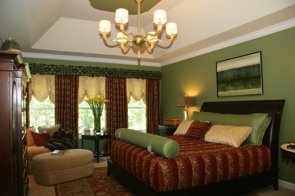 Design ideas for a large eclectic master bedroom in St Louis with green walls and carpet.