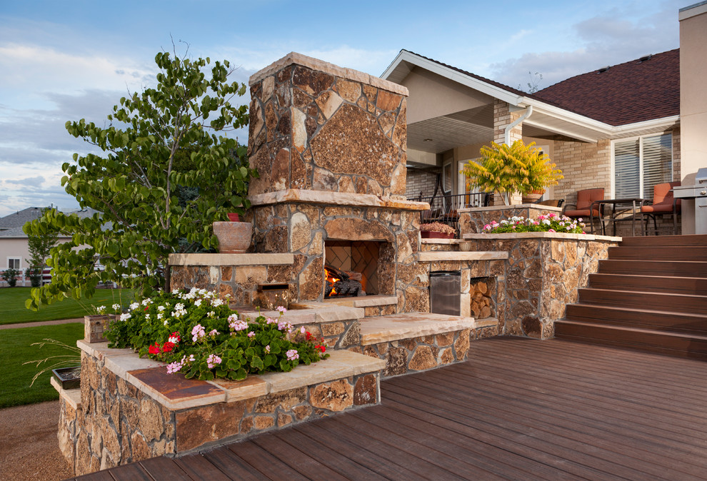 Design ideas for a traditional backyard deck in Salt Lake City with a fire feature and no cover.
