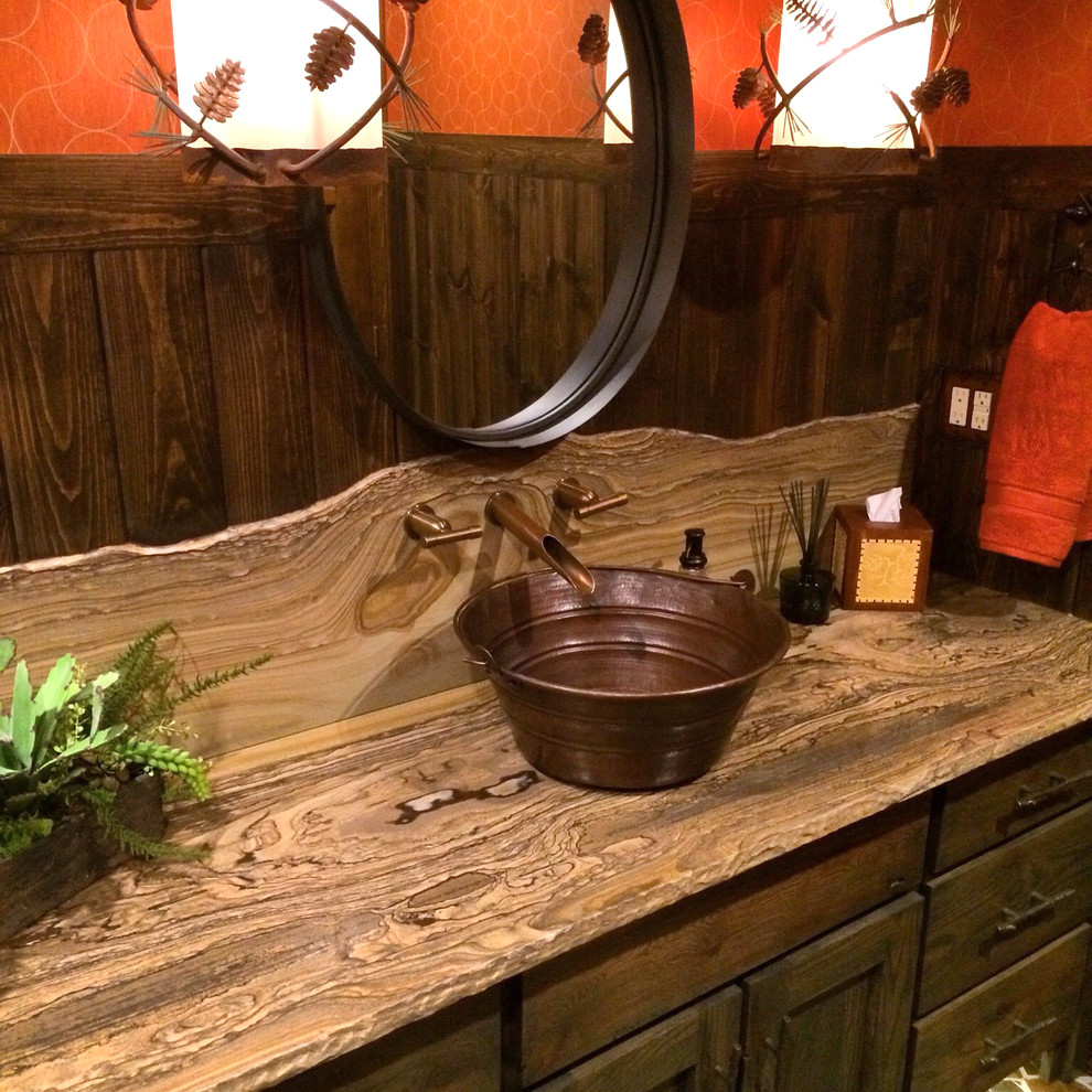 Inspiration for a mid-sized country bathroom in Other with furniture-like cabinets, green cabinets, a drop-in tub, a shower/bathtub combo, a two-piece toilet, orange walls, a vessel sink and quartzite benchtops.