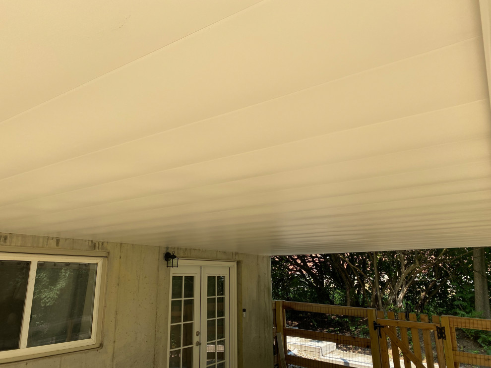 Inspiration for a large transitional backyard second story metal railing deck remodel in Cincinnati