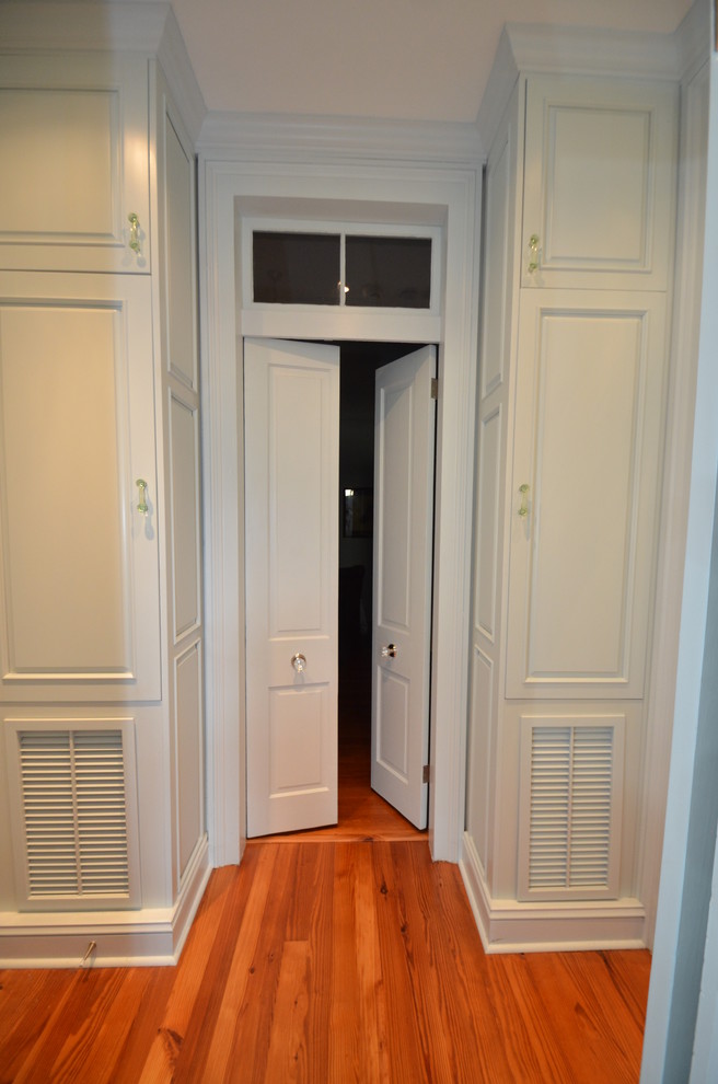 Photo of a transitional storage and wardrobe in New Orleans.