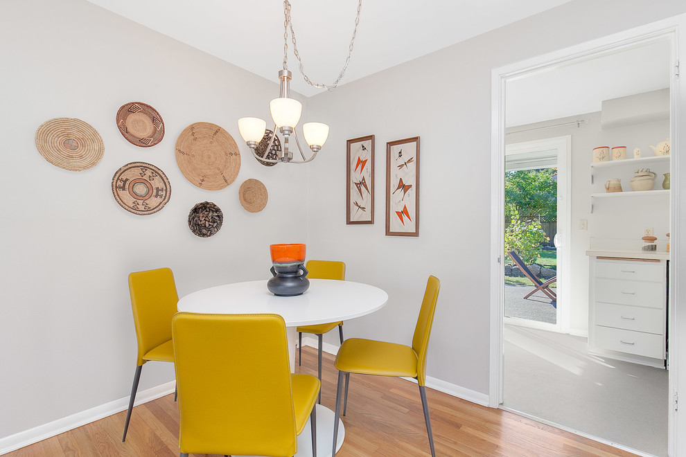 This is an example of a transitional separate dining room in Seattle with no fireplace.