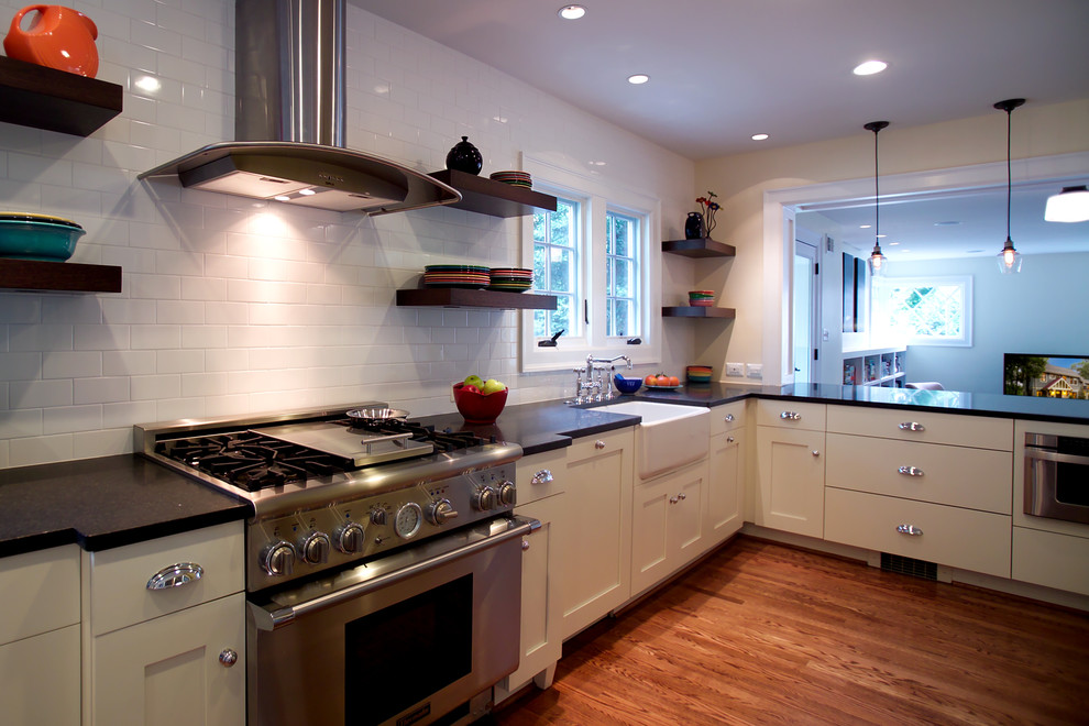 Inspiration for a traditional kitchen in DC Metro with stainless steel appliances and a farmhouse sink.