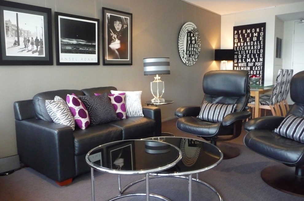 Design ideas for a mid-sized contemporary open concept living room in Sydney with grey walls and carpet.