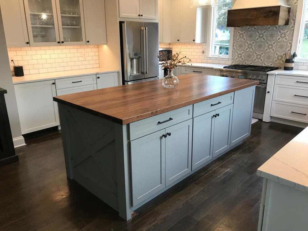 Inspiration for a large country kitchen in Philadelphia with wood benchtops and with island.