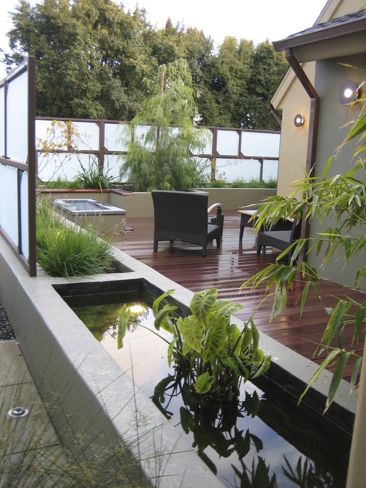 Contemporary deck in San Luis Obispo with a fire feature.