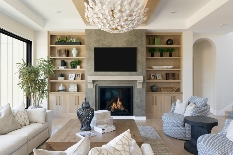 Family room - huge contemporary light wood floor family room idea in Minneapolis with gray walls, a standard fireplace and a wall-mounted tv