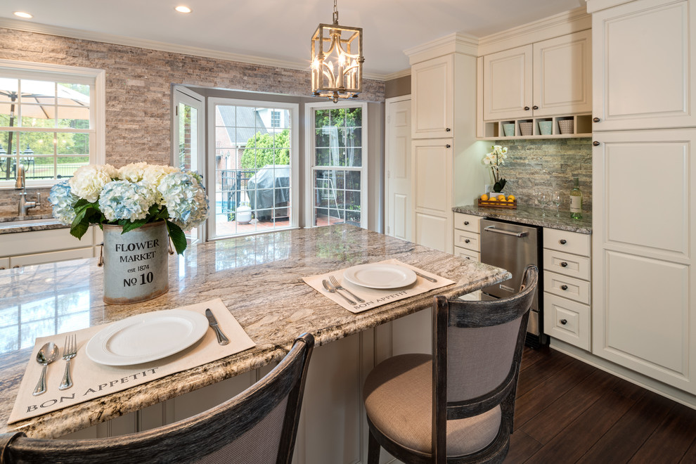 Large elegant u-shaped bamboo floor and brown floor eat-in kitchen photo in Atlanta with an undermount sink, raised-panel cabinets, white cabinets, granite countertops, stainless steel appliances, an island, brown backsplash, stone tile backsplash and multicolored countertops