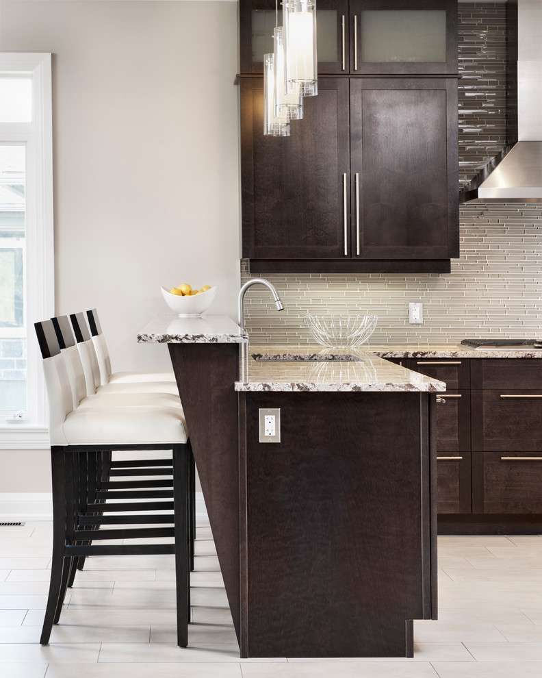Inspiration for a transitional kitchen in Ottawa with shaker cabinets and stainless steel appliances.