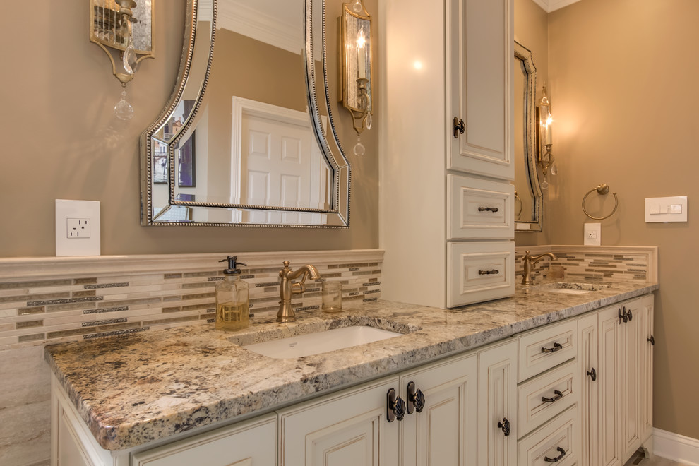 Design ideas for a large modern master bathroom in Other with louvered cabinets, distressed cabinets, a freestanding tub, an alcove shower, gray tile, white tile, matchstick tile, beige walls, porcelain floors, an undermount sink and granite benchtops.